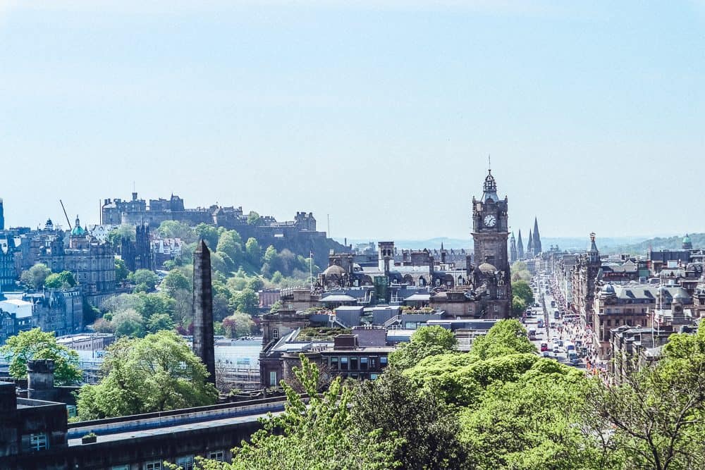 View of a historic city skyline under a blue sky