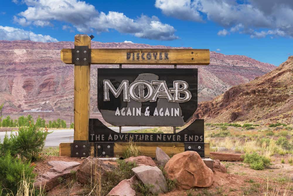 Sign that says "Moab again and again. The adventure never ends."