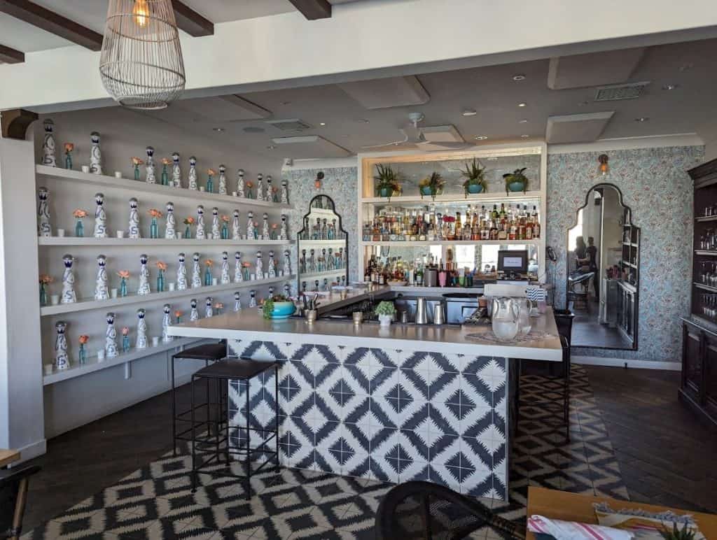 A mosaic tiled bar in a boutique bar in Palm Springs.