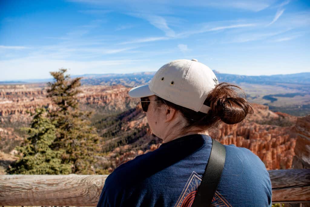 Girl looking out at hoodoos.