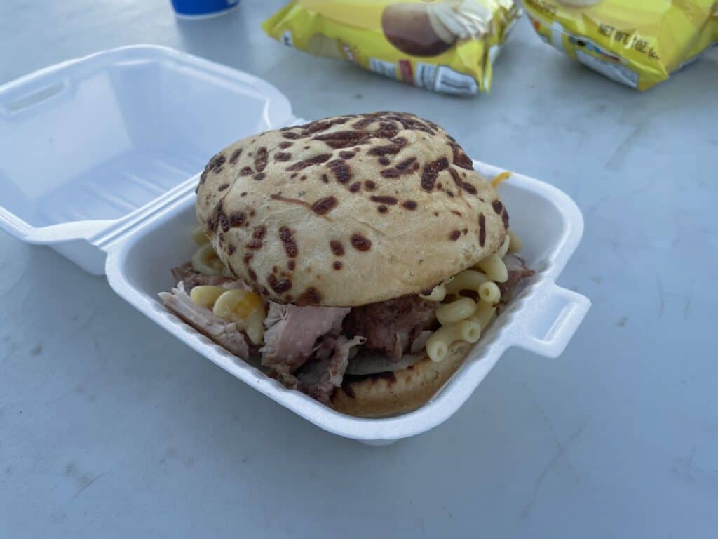 Barbecue sandwich with brisket and macaroni and cheese.
