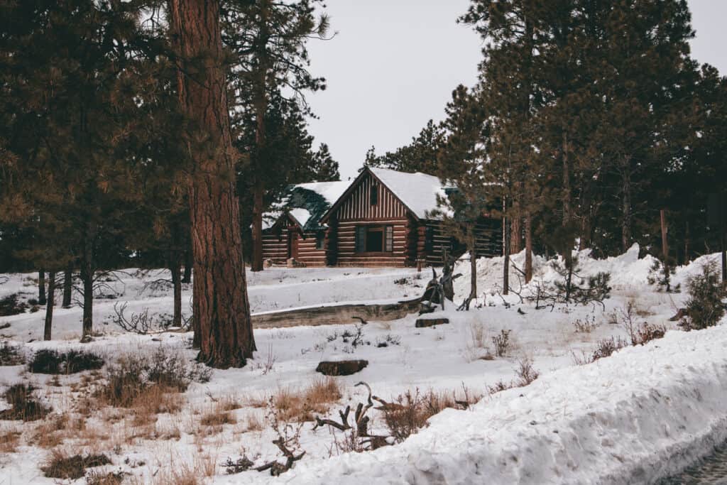 Lodge building surrounded by snow.